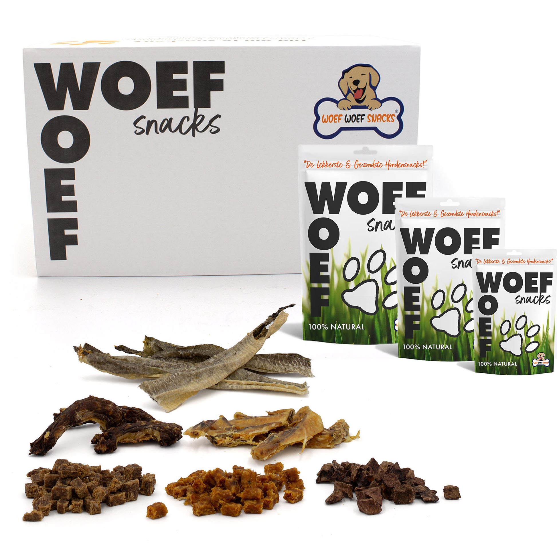 De Woef Woef Snackbox voor de kleine honden. Het bevat 6 verschillende soorten snacks. Op de afbeelding zie je verder nog wat sta zakken en verschillende natuurlijke snacks.